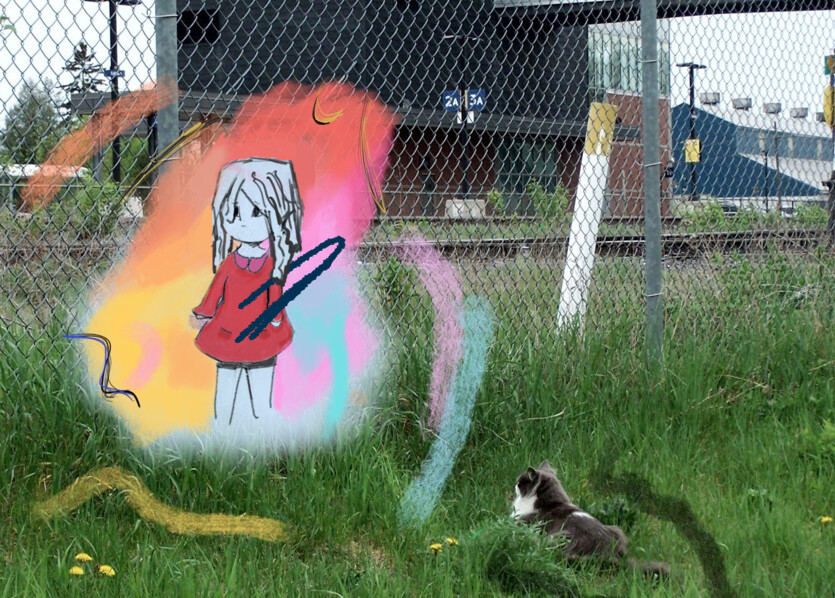 The background of the picture is a real life photograph, showing a cat lying in grass looking through a fence at a rail station. Between the cat and the station is a drawing on top of the photograph. It shows a little femme-presenting person looking curiously around them. They are wearing a red dress with a pink collar and short shorts, and have wavy shoulder-length hair. They are surrounded by a hazy colourful rainbow world.